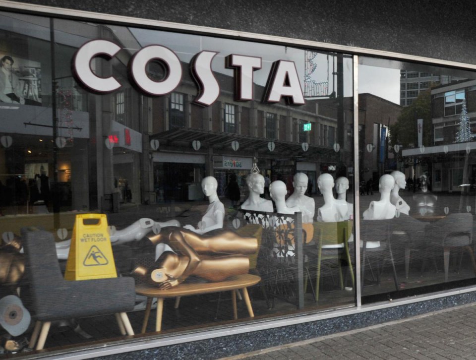 Pranksters set up the X-rated scene in an empty Costa window - in full view of the street