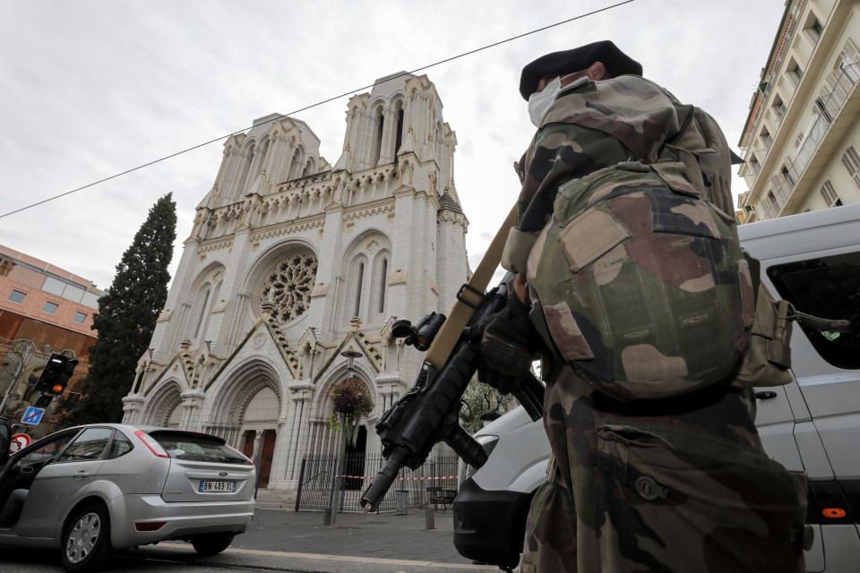 French soldiers stand guard outside Notre Dame in Nice