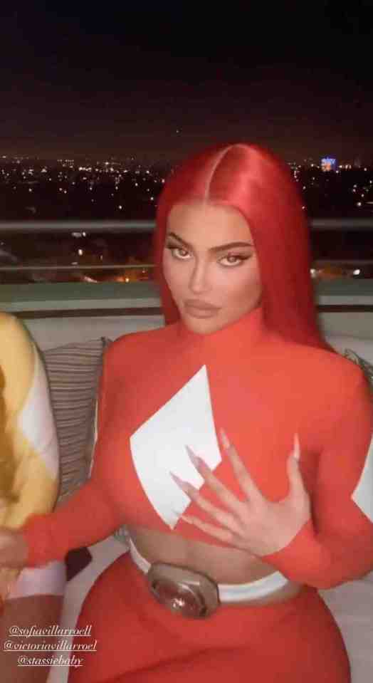 Kylie Jenner shows her superhero side and morphs into red a Power Ranger