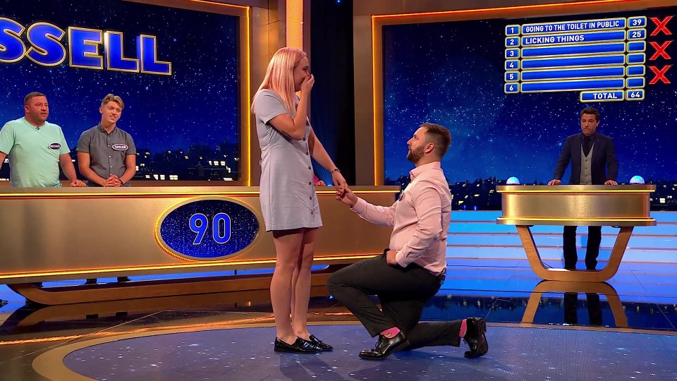 Joe surprises Nadine as he proposes to her on the ITV game show 