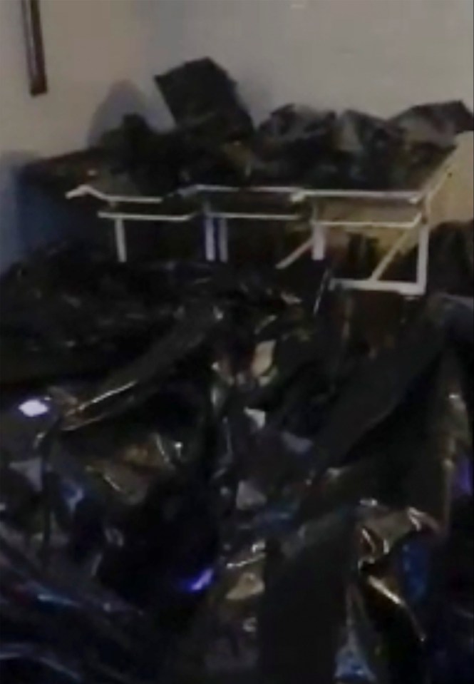 Footage shows bodies covering the floor of a morgue in Russia