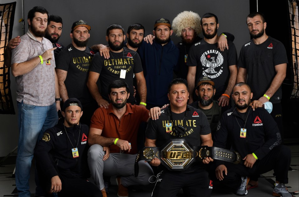 Nurmagomedov and his team celebrate the title win