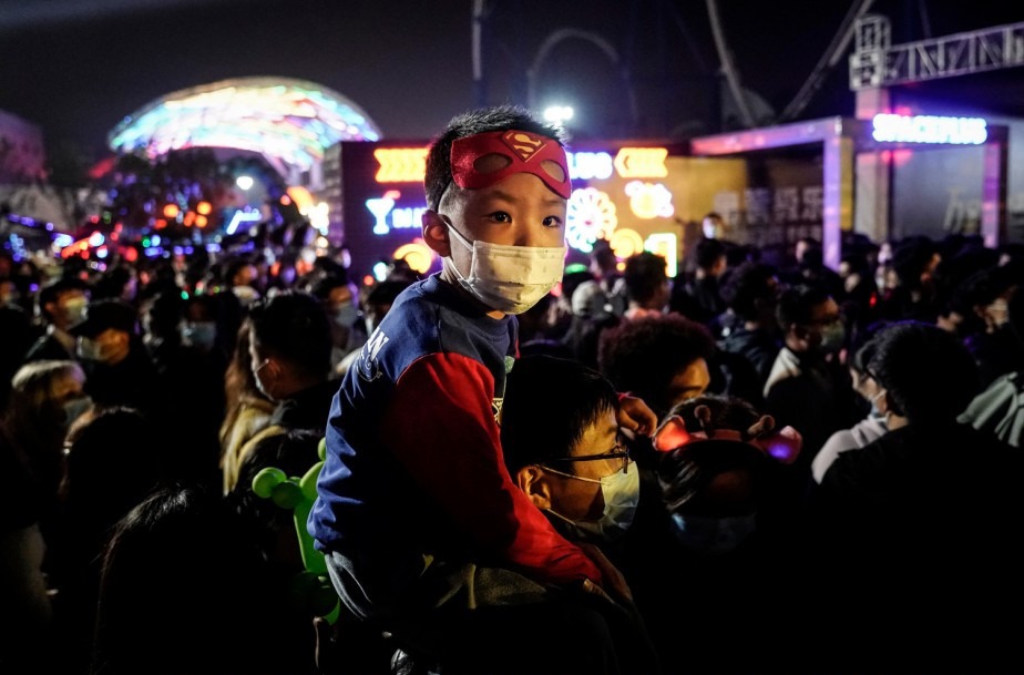 Only a handful of people wore masks during the elaborate celebrations