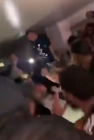 Students were filmed dancing on tables at a raucous party last night