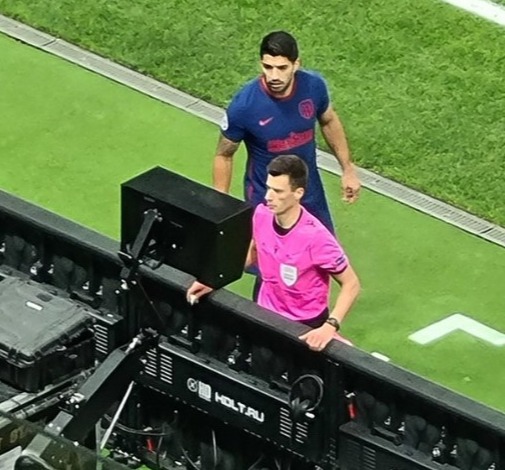 Luis Suarez was booked for taking a look at the VAR monitor over the ref's shoulder