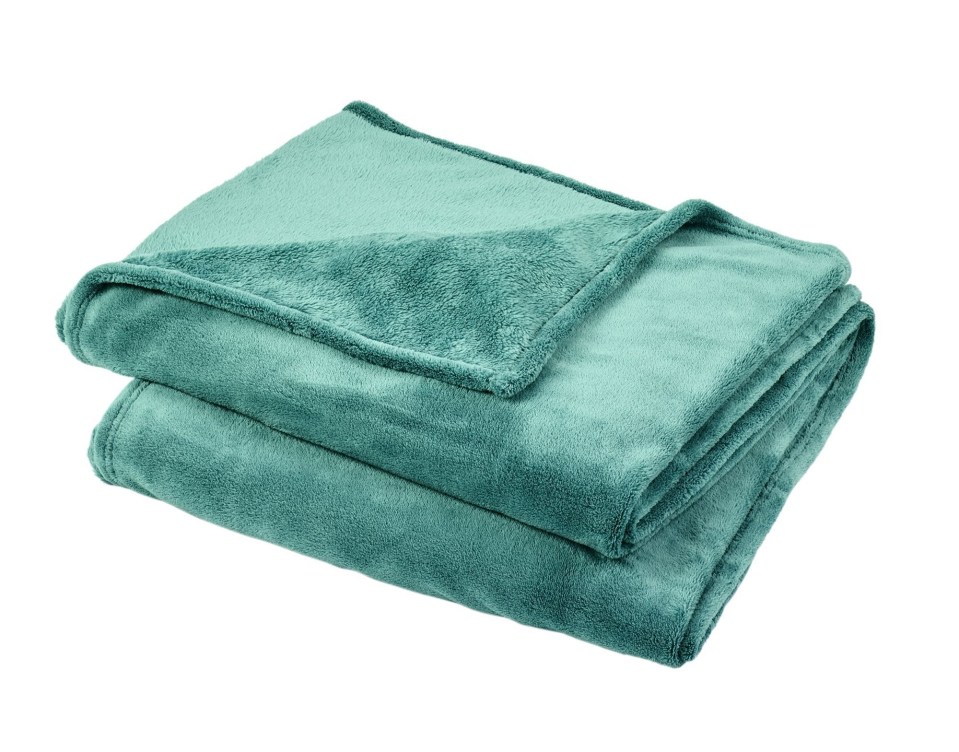 This green fleece throw will keep you warm and keep your home on-trend