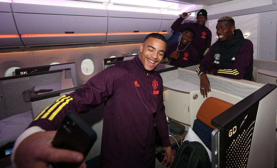 Mason Greenwood took a snap as the players boarded their plane