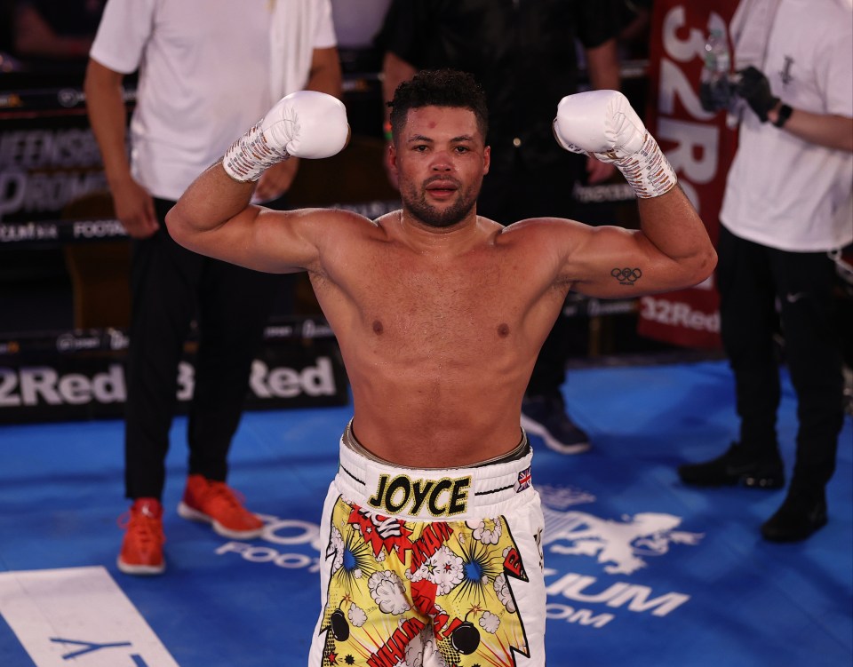 Joyce celebrates his stunning win - which should catapult him to world level