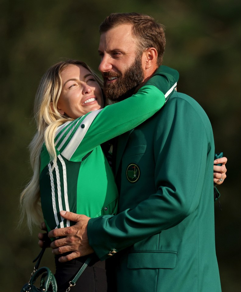 Johnson is congratulated by stunning fiancee Paulina after winning The Masters