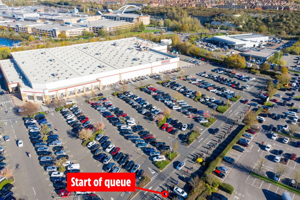 Shocking aerial photos show a line of shoppers snaking its way through the Costco car park in Lakeside, Essex