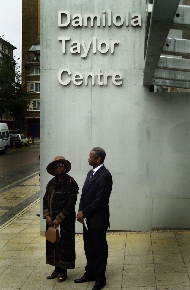 Gloria and Richard Taylor outside the Damilola Taylor Centre, on the first anniversary of his death