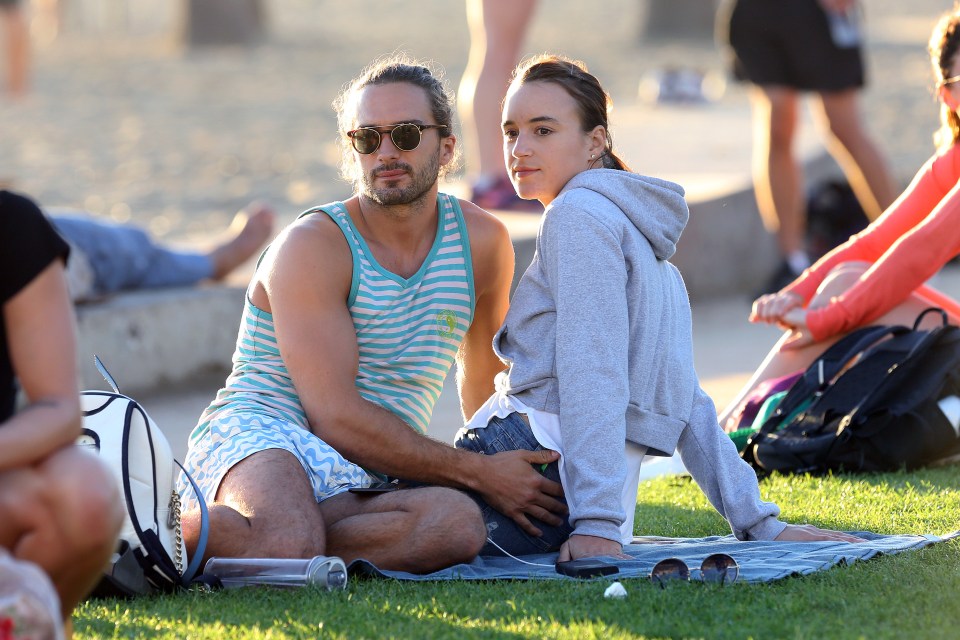 Joe and Rosie relax on the beach in Santa Monica