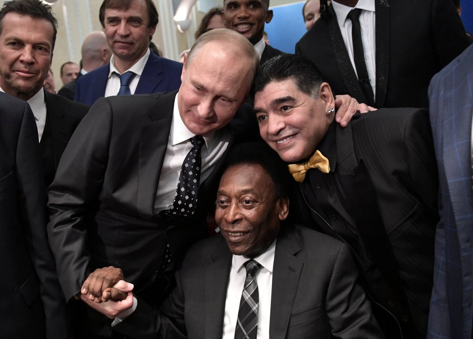 The globe-trotting Maradona is pictured alongside Pele and Russian leader Vladimir Putin 