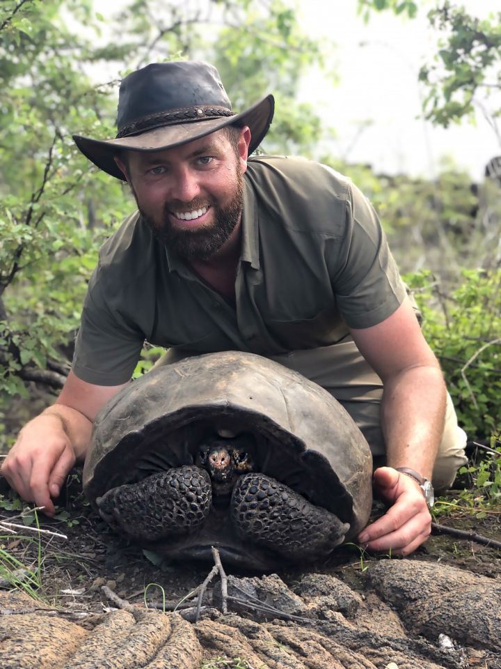 Forrest Galante with Fern the Fernandina Tortoise, thought to have been extinct, found on a volcanic island on February 17, 2019 in the Galapagos archipelago