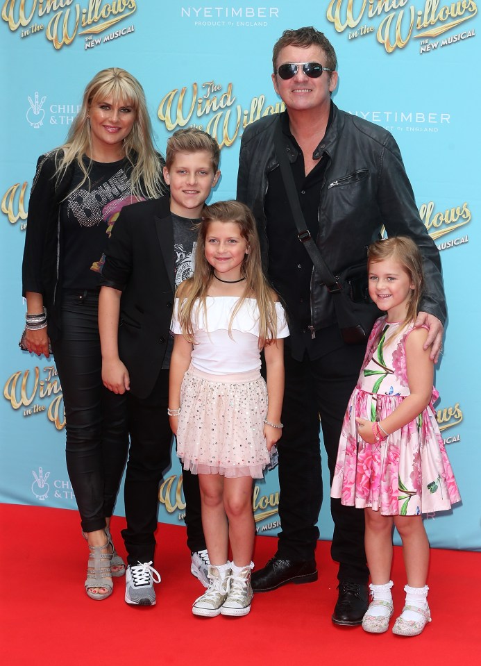 Shane has three children with actress Christie 