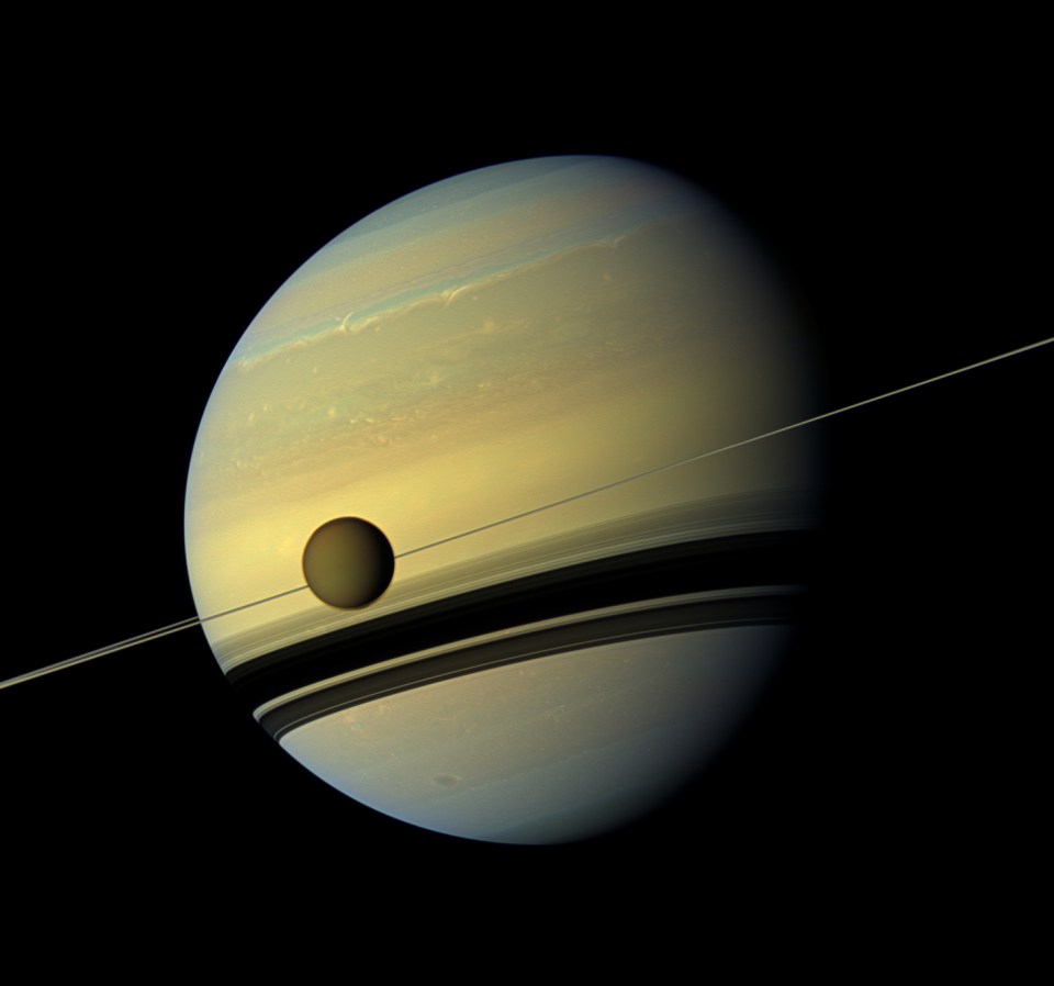 View of Saturn and its moon Titan from Nasa's Cassini spacecraft