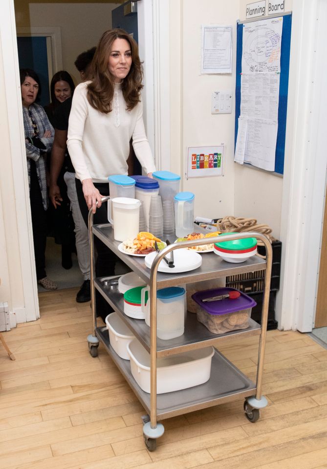 The Duchess of Cambridge serving breakfast during a visit to London Early Years Foundation Stockwell Gardens Nursery and Pre-school in January