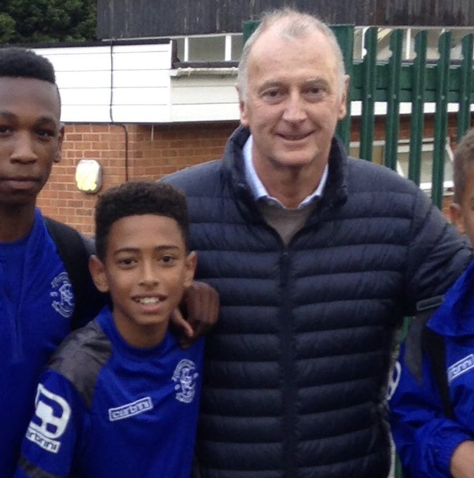 A young Bellingham poses with Birmingham legend Trevor Francis