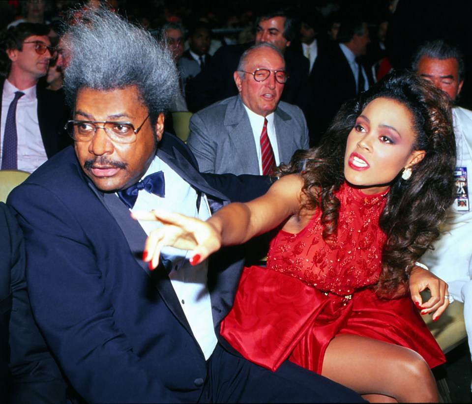 First wife Robin and promoter Don King watch Tyson in 1988