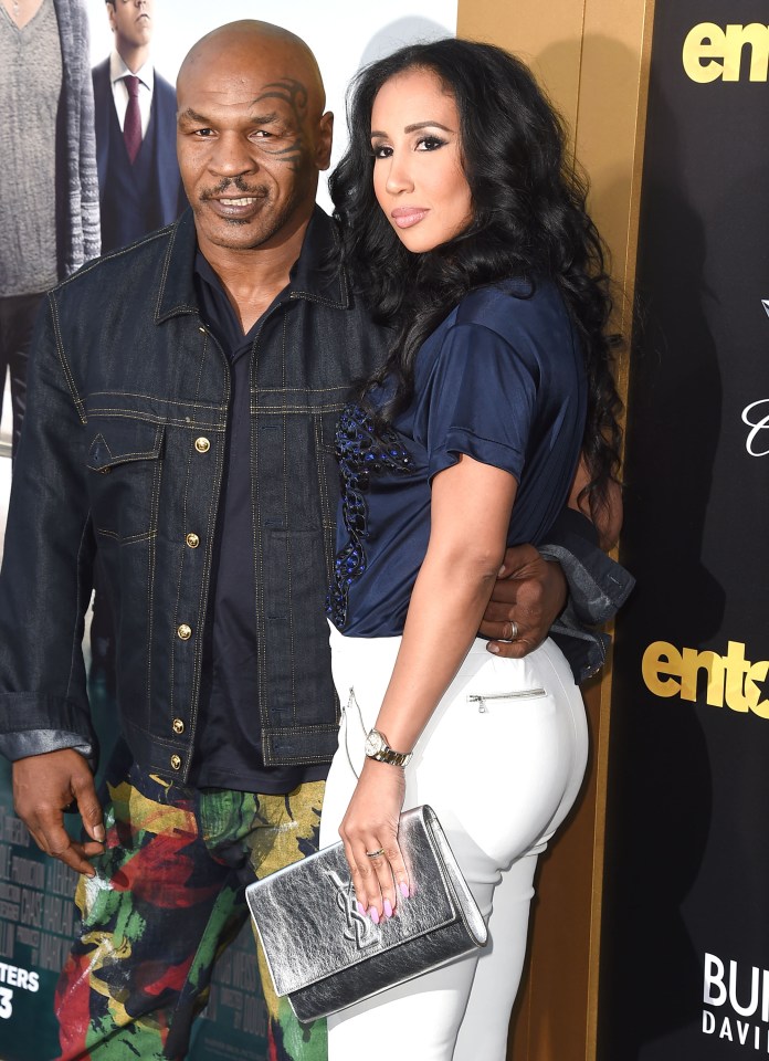 Tyson with third wife Lakiha Spicer, who he married in 2009