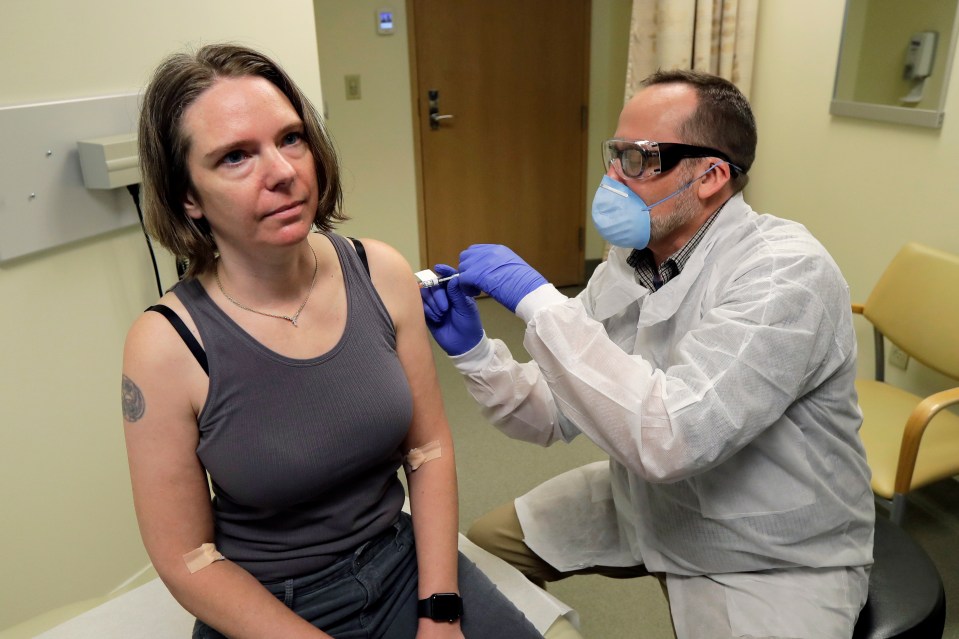 A coronavirus vaccine from US firm Moderna has been found to be 94 per cent effective, picture, a volunteer having a jab during the trial's first phase