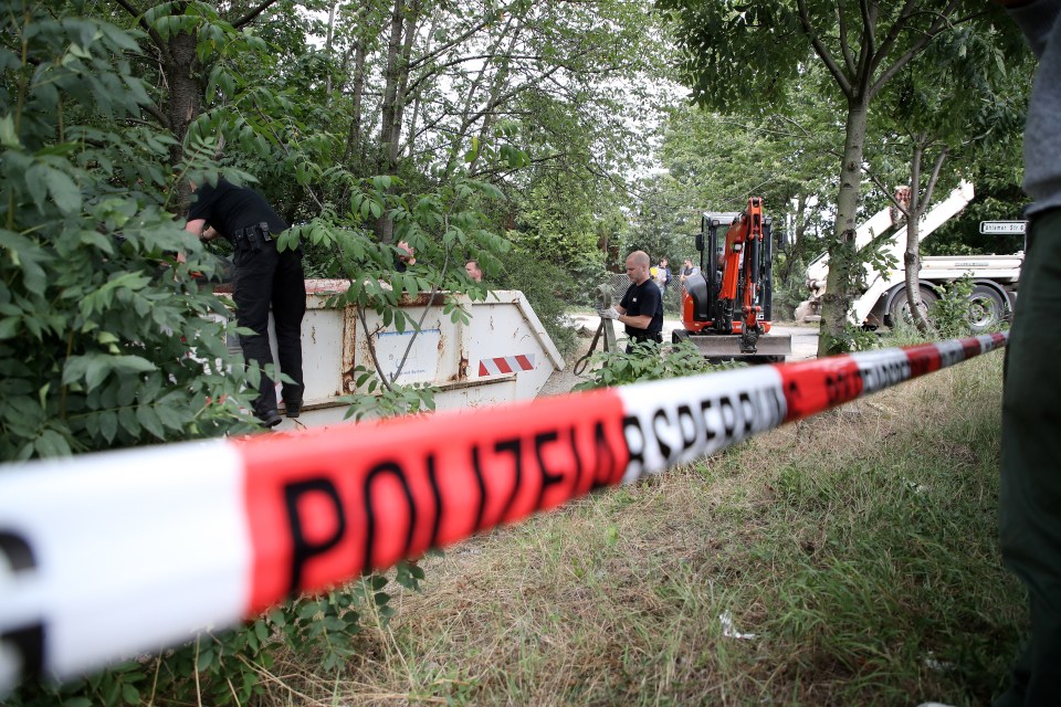 Police search an allotment in Hanover, Germany previously used by Christian B in July