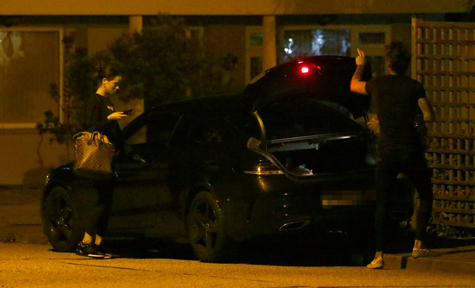 In August, Maura was pictured with an overnight bag arriving back to Chris' house