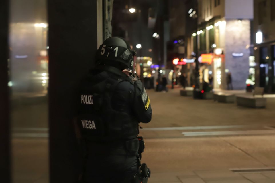 An Austrian policeman overlooks a street in Vienna