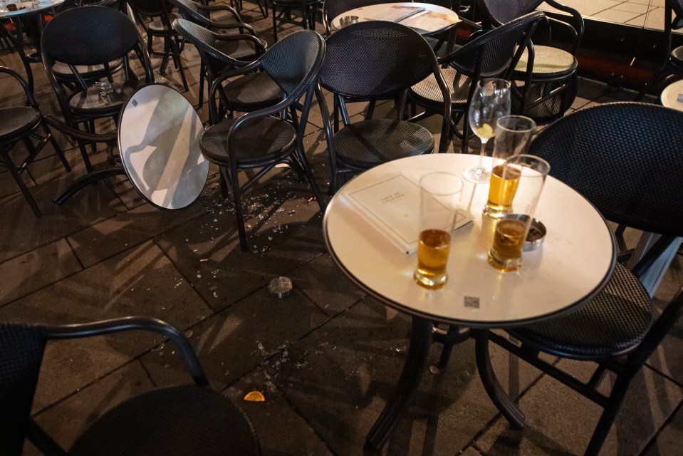 Tables are overturned and glasses and smashed in Vienna