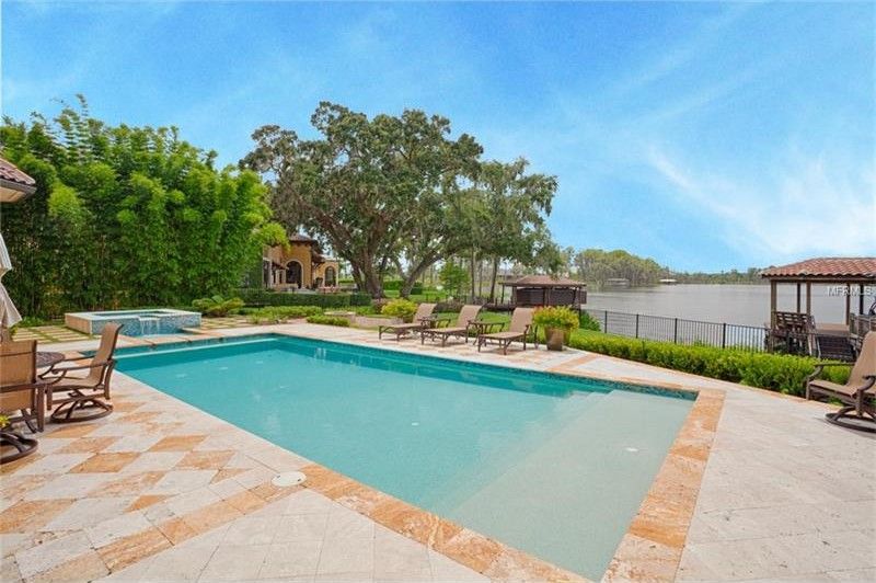 Lake Isleworth is in firm view from the swimming pool and jacuzzi