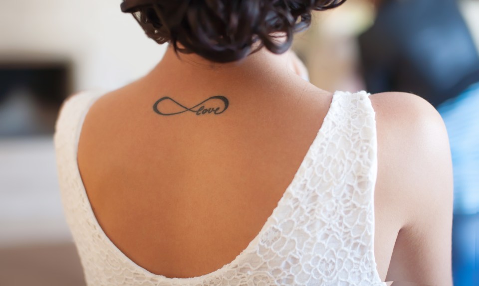 The infinity symbol is too common, according to some, with many woman choosing the basic design