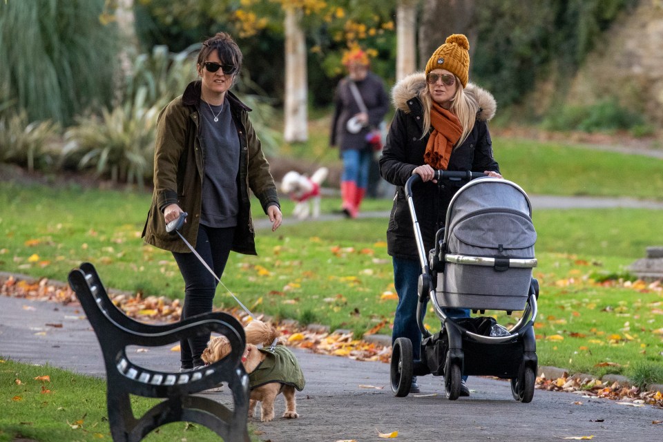 They looked on at Fred as he sniffed away at a park bench 