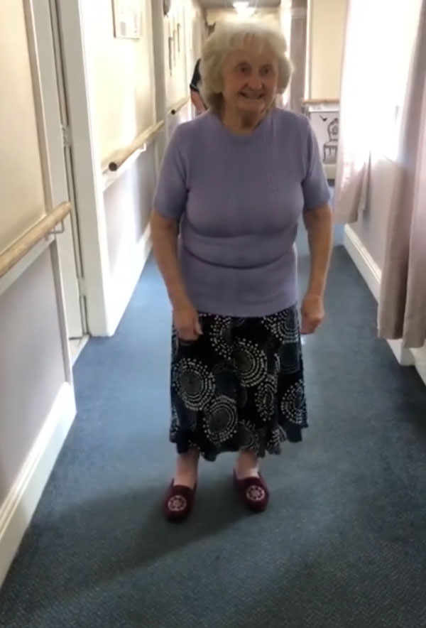 Doreen enjoys having a dance at the care home in Bradford, West Yorks 