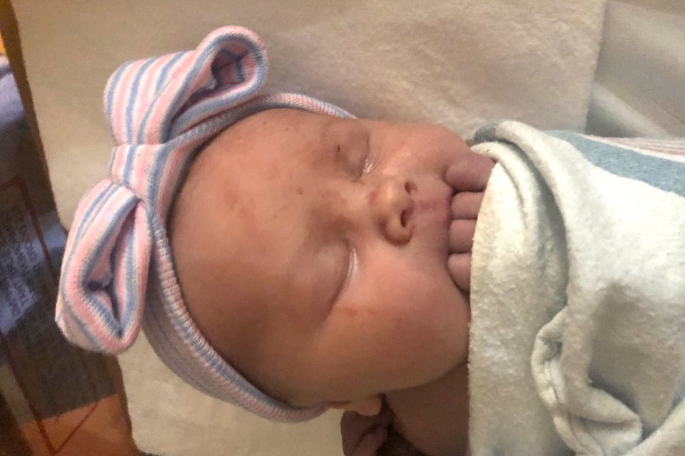 Maggie Jayne was born on Thursday and will grow up with fourteen big brothers