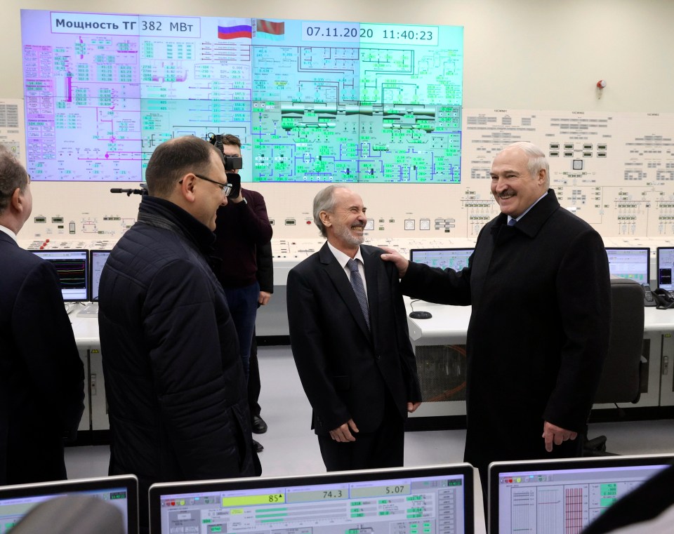  Belarus President Alexander Lukashenko, right, at the plant's power launch event on Saturday