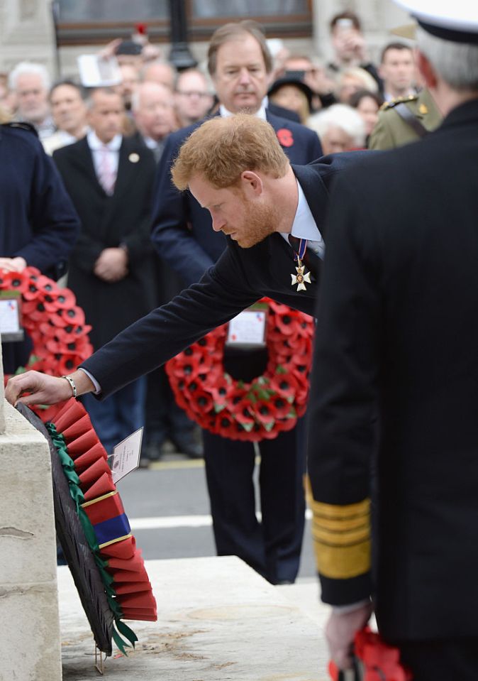 Prince Harry is pictured laying a wreath at the Cenotaph in 2016