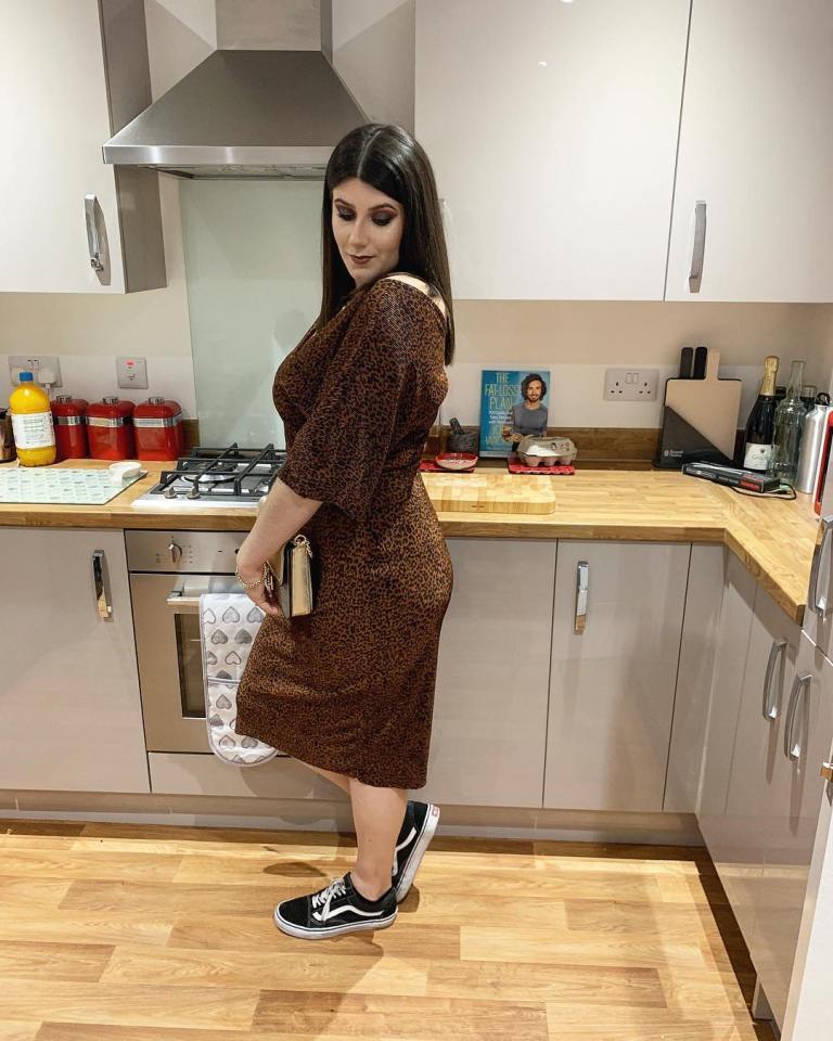 Her kitchen is the perfect backdrop for a pre night out selfie