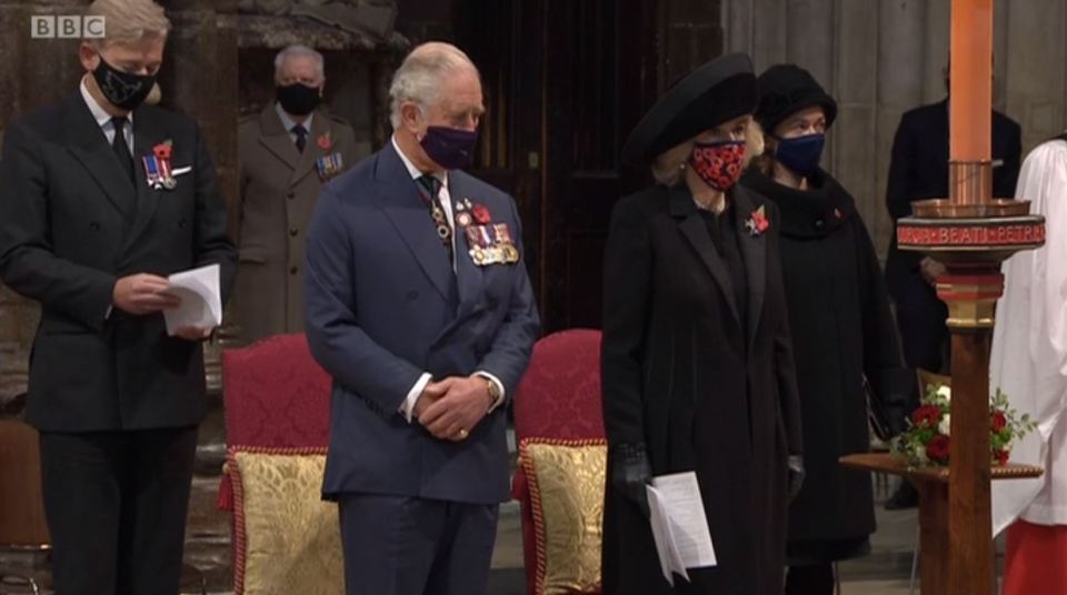 Charles and Camilla observe the two-minutes' silence at Westminster Abbey