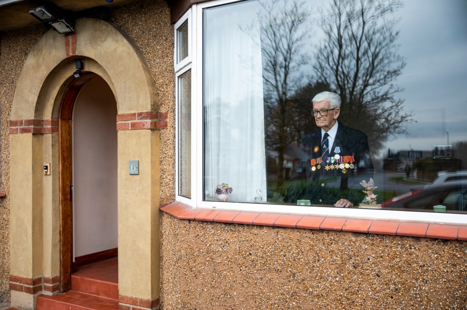 WWII Arctic Convoys Veteran David Craig 95 observes the two-minutes' silence from his home in Kilmarnock