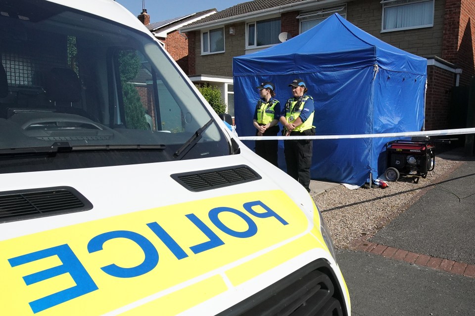 Cops pictured outside Letby's home in Hereford when she was previously arrested