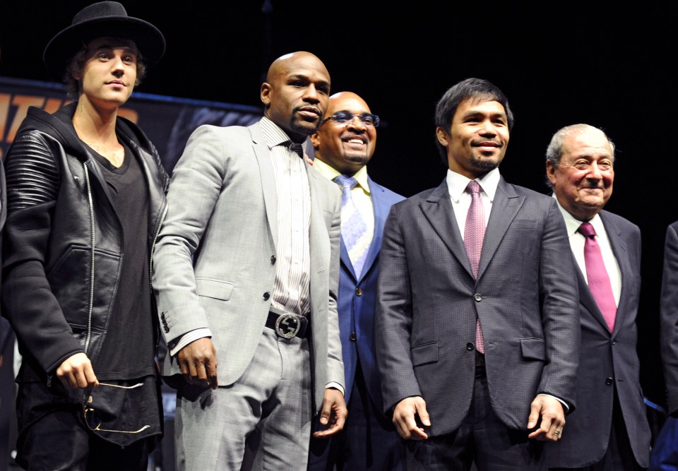 Floyd Mayweather pictured with Arum and Pacquiao 