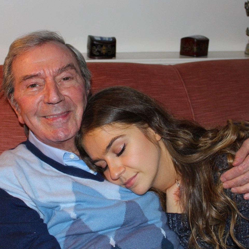 Kristina pictured cuddled up to her beloved dad