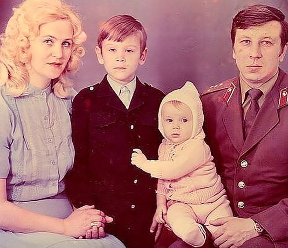 Baby Olga with her parents and older brother