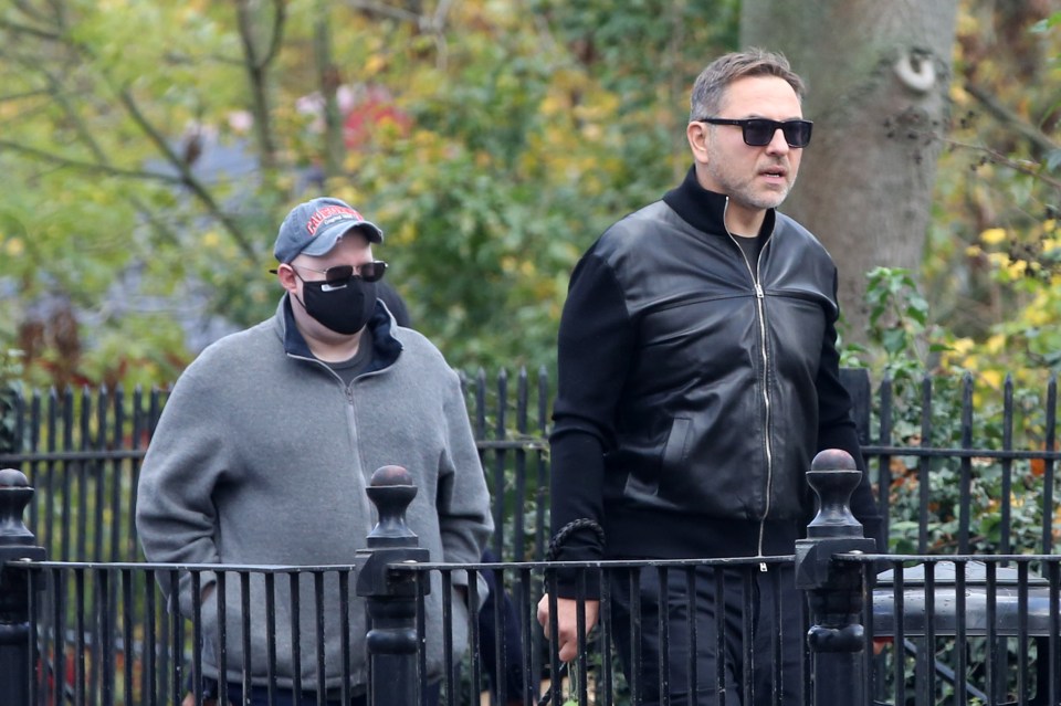 Bake Off host Matt, 46, wore a black face covering throughout the walk, but David, 49, was mask-free