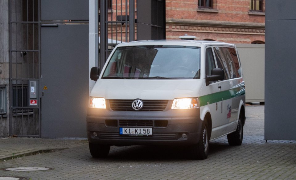 A prison van carrying Christian B arrives at Braunschweig regional court today