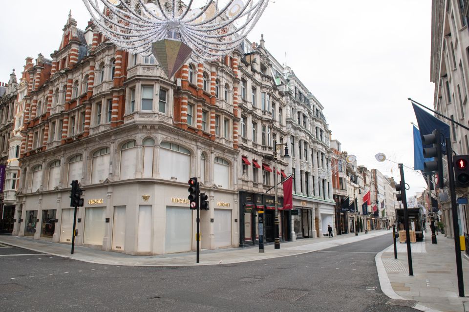  Closed shops pictured on an empty New Bond Street, London, as England continues another lockdown