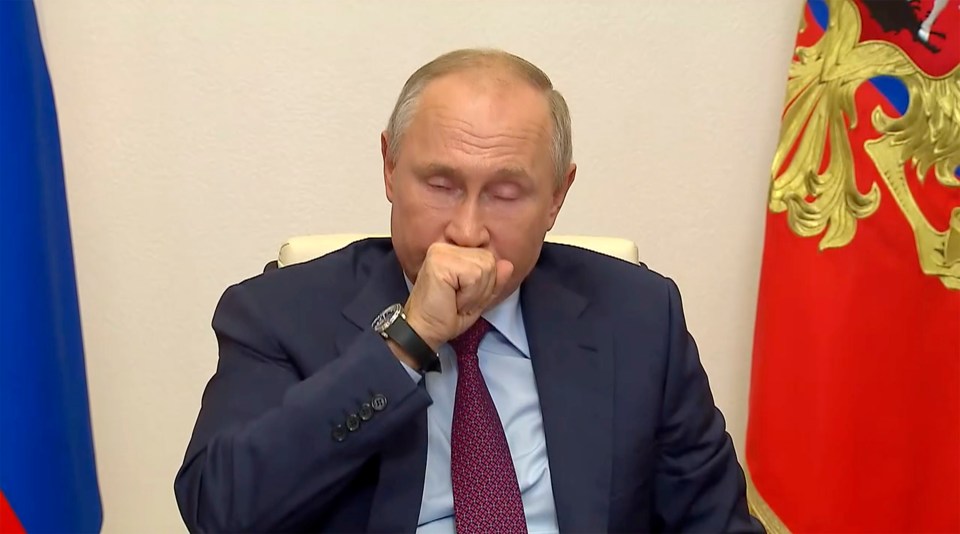 Putin was seen coughing as he addressed a televised Covid conference 