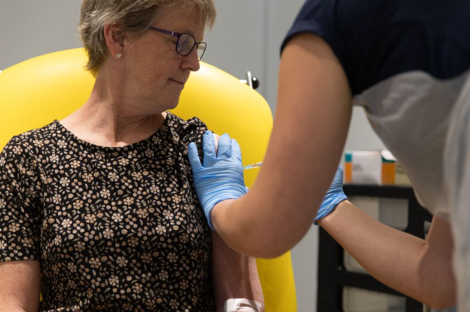 A volunteer being administered the Oxford/AstraZeneca coronavirus vaccine 