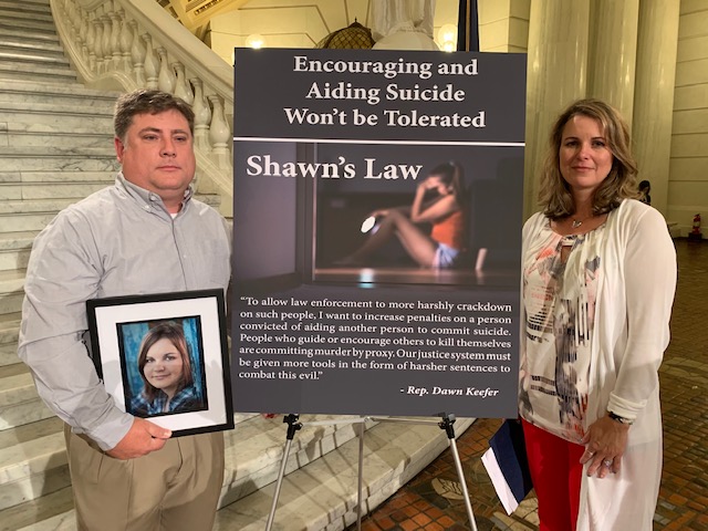 Jackie, pictured with her husband and Shawn's stepfather Chip, is now fighting to get the suicide forum shut down