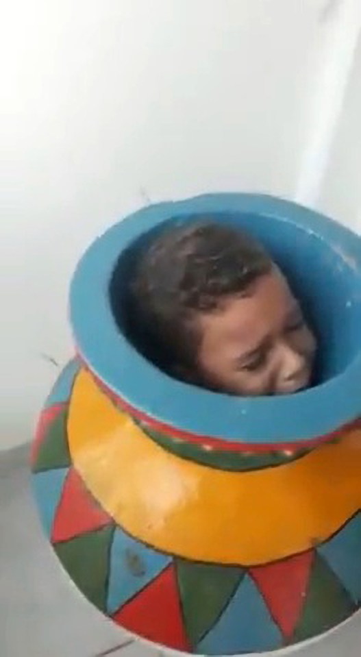 The boy was stuck inside the vase at the family home in Brazil